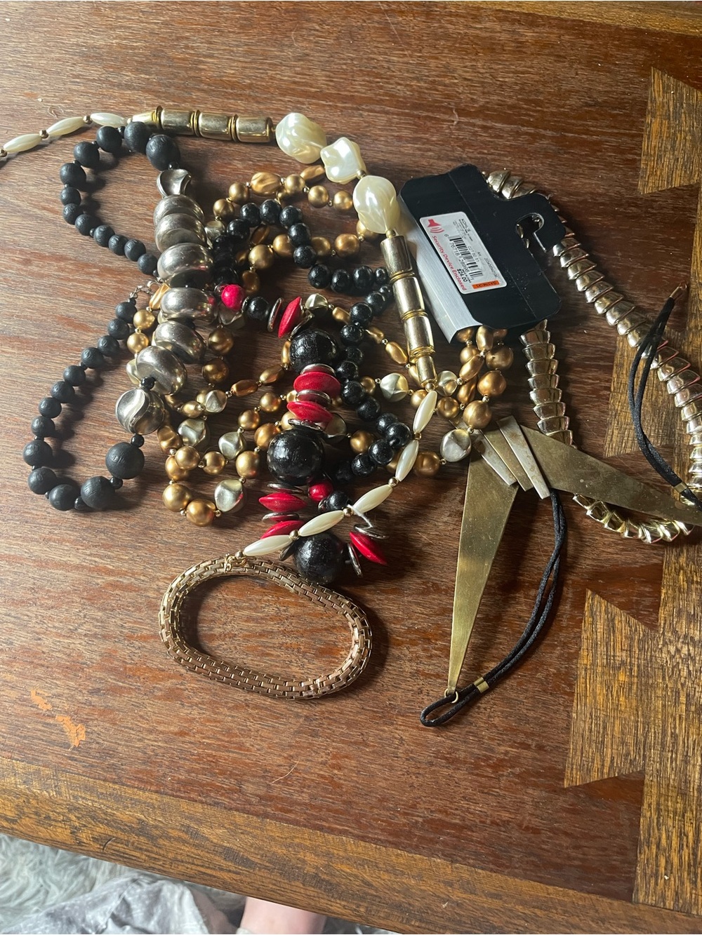 Mixed Bead 8 different bNecklace in Black, Red and Gold Tones.